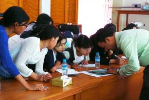 Participants are being trained in analyzing maps produced as part of International Charter activations.