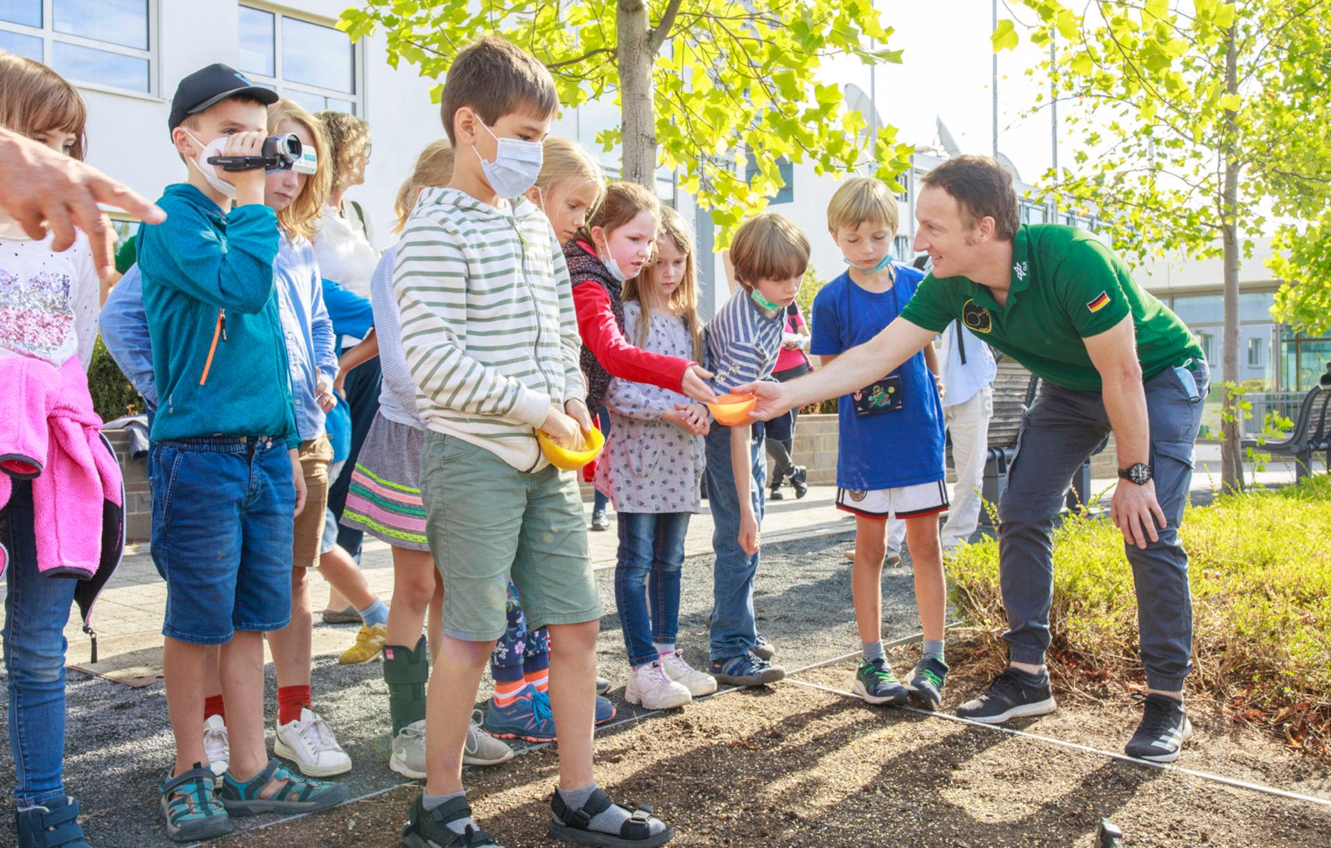 Planting seeds with an astronaut