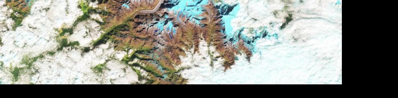 The false-color images above show a glacial lake in the Himalayas nearly doubling in length over 30 years. Ice is represented as light blue, while significant meltwater is dark blue. Rocks are brown; vegetation is green. The growth of glacial lakes can increase the risk of flooding in nearby valleys. Image: NASA.