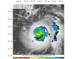 Satellite image from the Naval Research Lab are overlaid with lightning strokes (shown as black circles) of Hurricane Mathew on 4 October 2016. Image: WWLLN-TC
