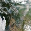 The image captured by MODIS shows dozens of wildfires in Canada 