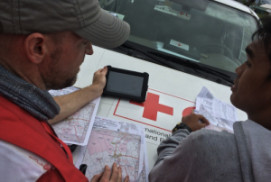 Red Cross members Use OpenStreetMap After Typhoon Haiyan in the Philliphines