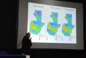 Member of Guatemalan team presenting drought maps.