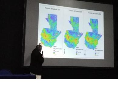 Member of Guatemalan team presenting drought maps.